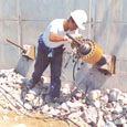 Injections of cement grouting under controlled pressure